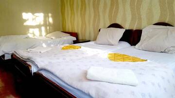 Фото номера Бюджетный трехместный номер Гостевой дом Mziuri Guest House г. Гонио 9