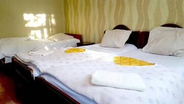 Фото номера Бюджетный трехместный номер Гостевой дом Mziuri Guest House г. Гонио 3